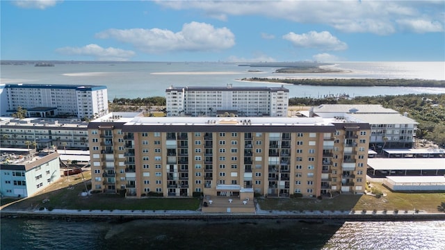 birds eye view of property featuring a water view