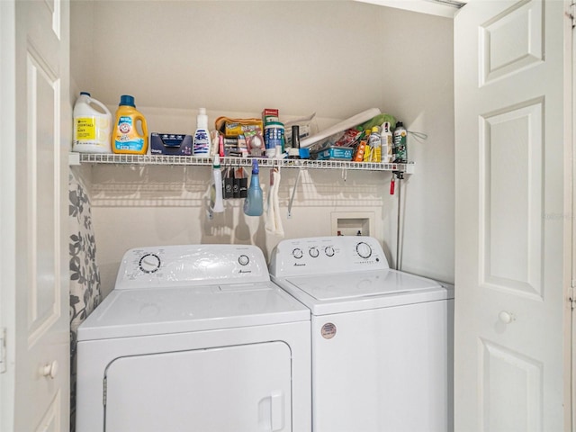 laundry room featuring washer and clothes dryer