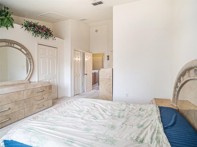 carpeted bedroom featuring a textured ceiling