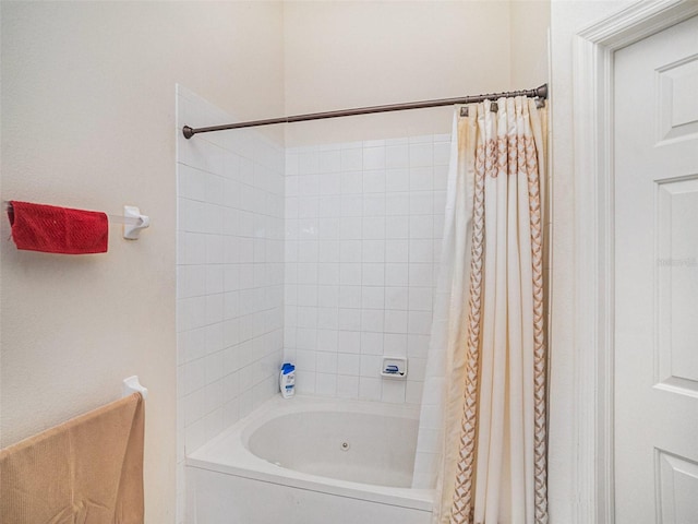 bathroom with shower / bathtub combination with curtain