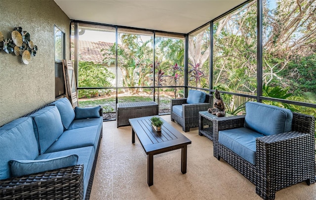 sunroom / solarium featuring plenty of natural light