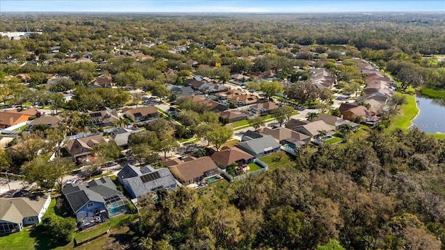 bird's eye view with a residential view and a water view