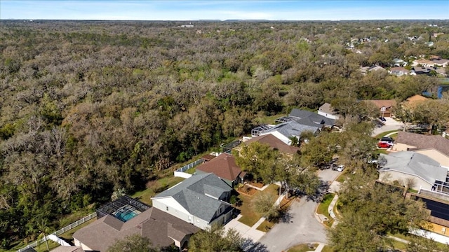 bird's eye view with a residential view and a view of trees