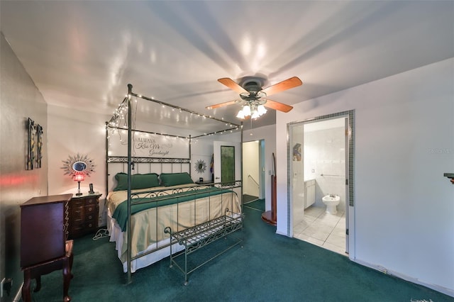 bedroom with carpet flooring, ensuite bathroom, and ceiling fan