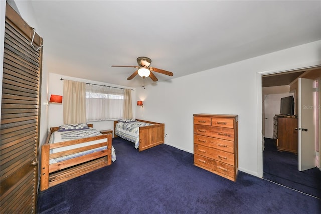 carpeted bedroom with ceiling fan