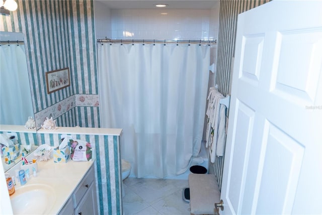 bathroom with vanity and walk in shower