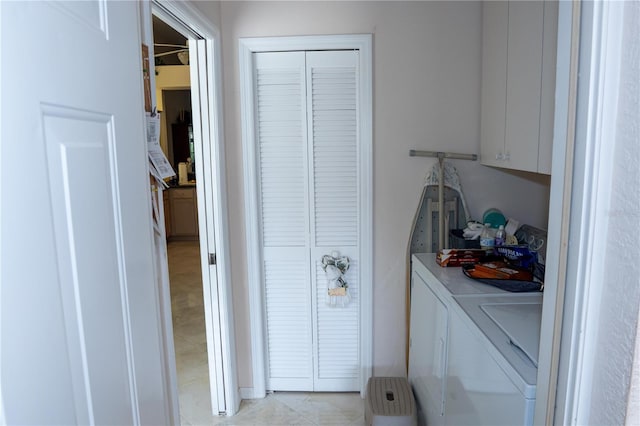 laundry area with independent washer and dryer