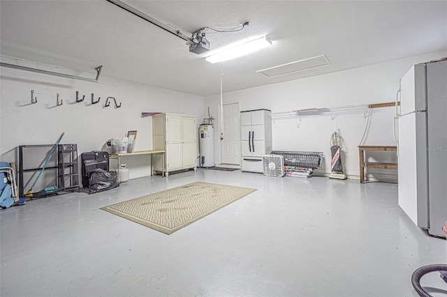 garage with white fridge, a garage door opener, and water heater