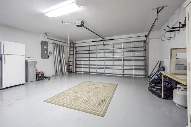 garage featuring white fridge, a garage door opener, and electric panel