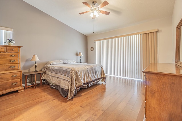 bedroom featuring ceiling fan and light hardwood / wood-style floors