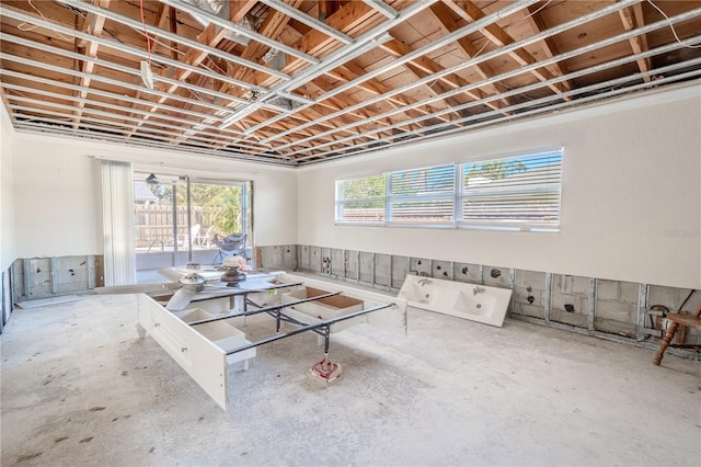 interior space featuring concrete flooring