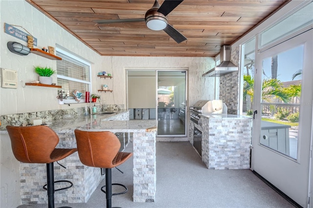 sunroom / solarium with a wealth of natural light, wooden ceiling, and sink