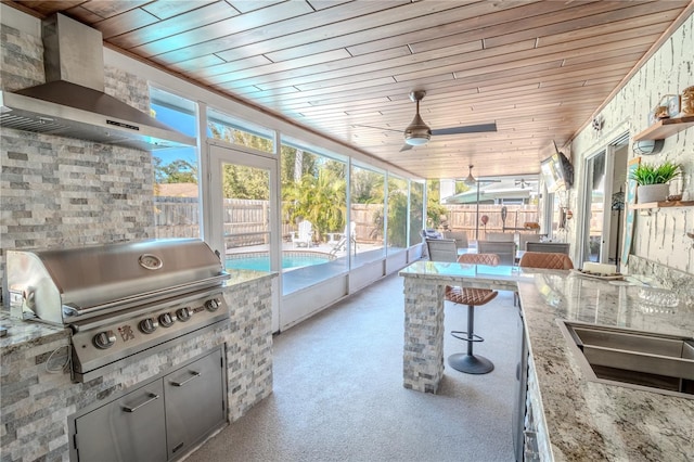 sunroom with wood ceiling