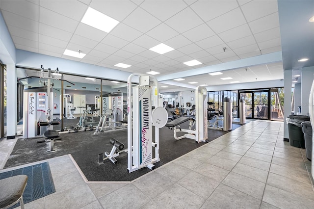 workout area with a drop ceiling