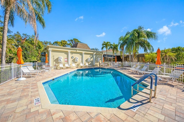 view of swimming pool with a patio area