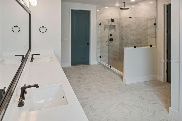 bathroom featuring vanity and an enclosed shower