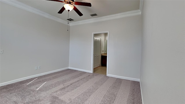 unfurnished room with light colored carpet, ceiling fan, and ornamental molding