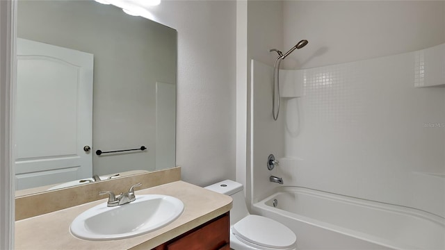 full bathroom with shower / bathtub combination, vanity, and toilet