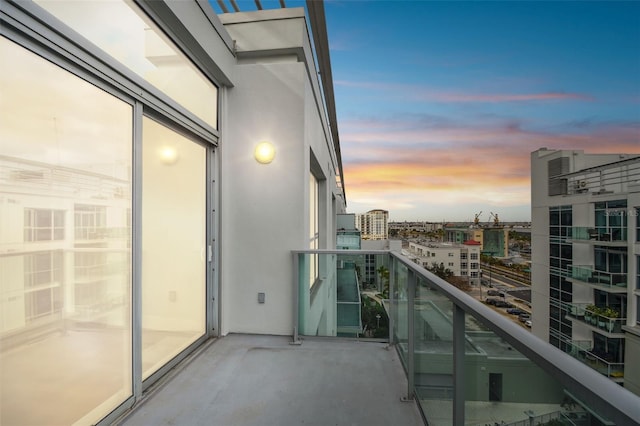 view of balcony at dusk