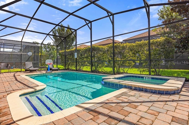 view of swimming pool featuring a lanai, an in ground hot tub, and a patio