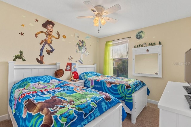 bedroom with light colored carpet and ceiling fan