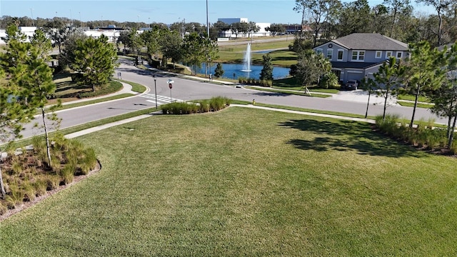 view of yard with a water view