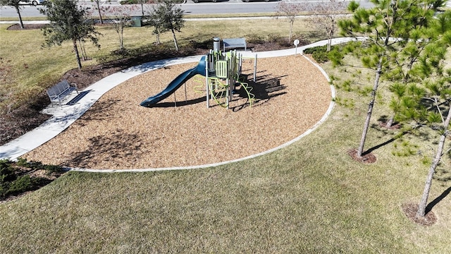 view of property's community with a playground