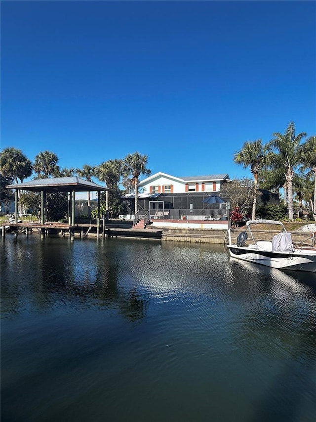 dock area featuring a water view