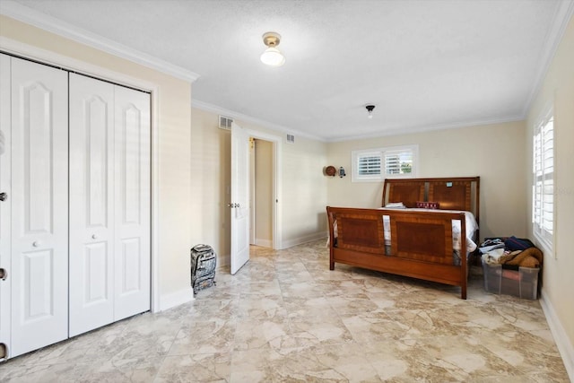 bedroom featuring a closet and ornamental molding