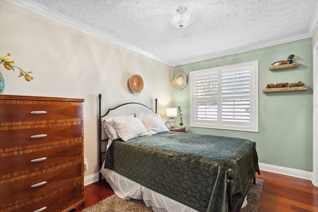 bedroom featuring a textured ceiling, dark hardwood / wood-style floors, and ornamental molding