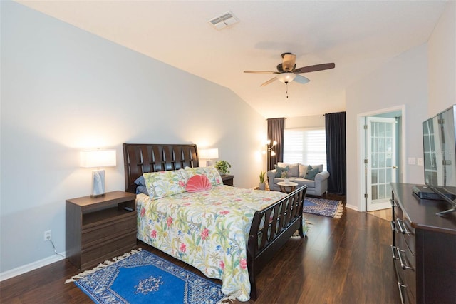 bedroom featuring vaulted ceiling, dark hardwood / wood-style floors, and ceiling fan