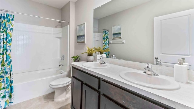 full bathroom with vanity, tile patterned flooring, shower / bathtub combination with curtain, and toilet