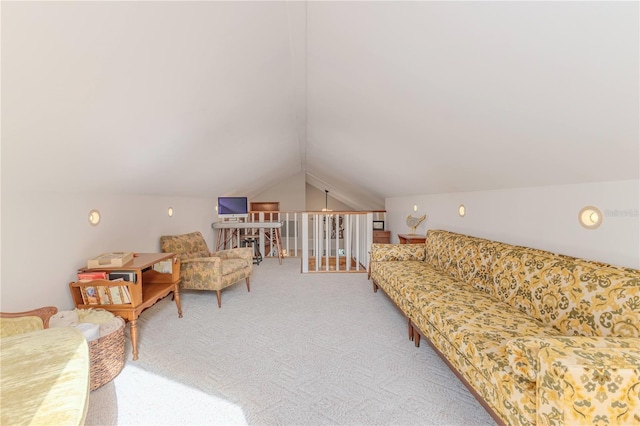 living room featuring carpet floors and vaulted ceiling