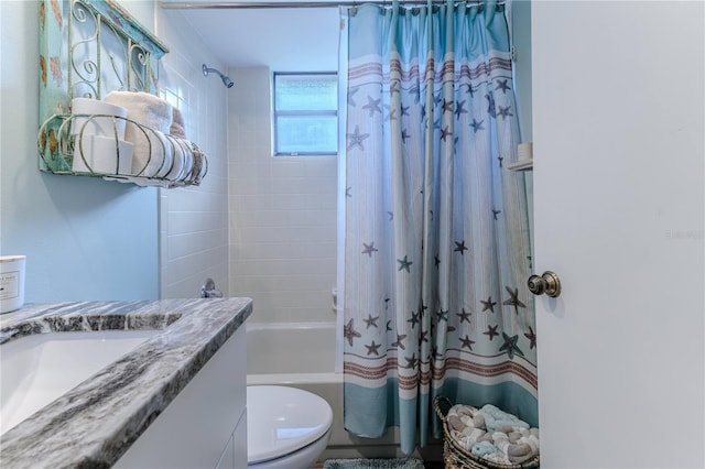 full bathroom with shower / tub combo, vanity, and toilet