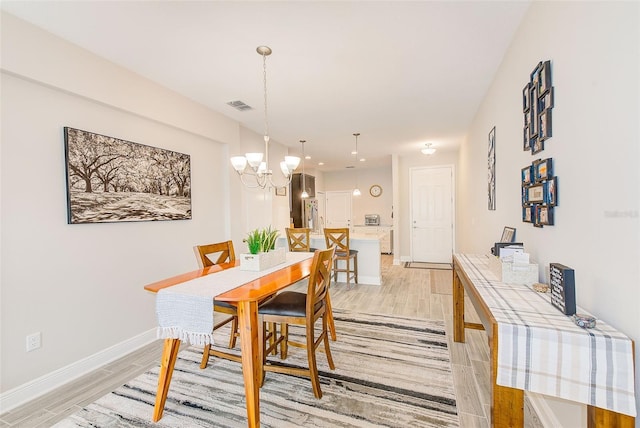 dining room featuring an inviting chandelier