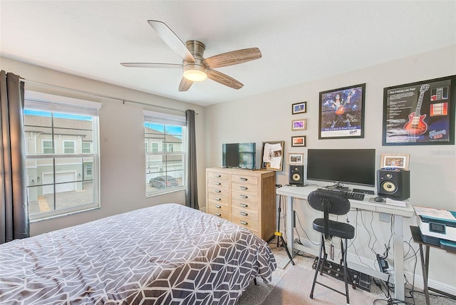 carpeted bedroom with ceiling fan