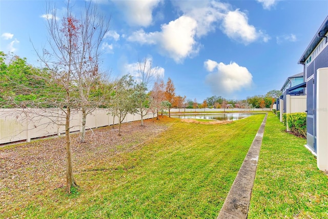 view of yard with a water view