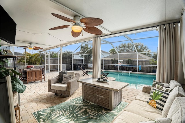 sunroom / solarium featuring a pool