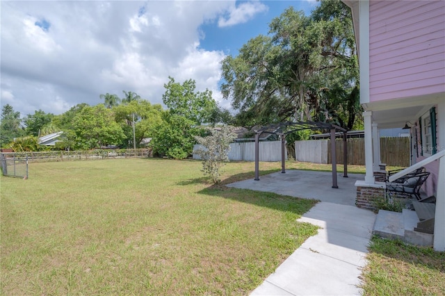 view of yard featuring a pergola and a patio area