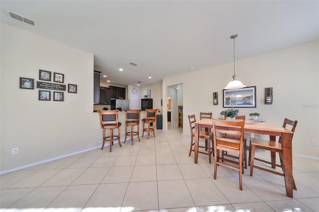 view of tiled dining space