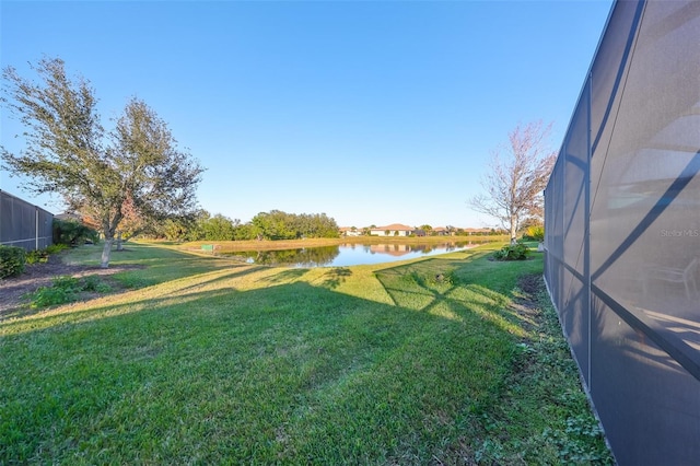 view of yard with a water view