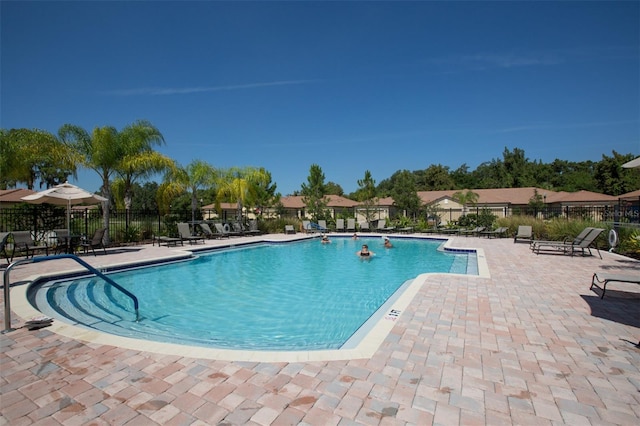 view of pool featuring a patio area