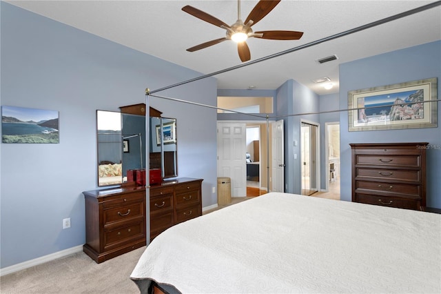 bedroom featuring ceiling fan, light carpet, and lofted ceiling