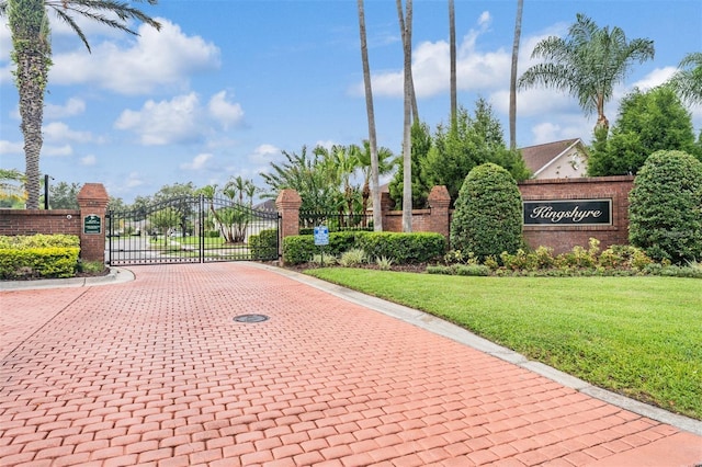 view of home's community featuring a lawn