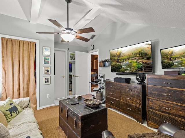 living room with ceiling fan, light colored carpet, a textured ceiling, and vaulted ceiling