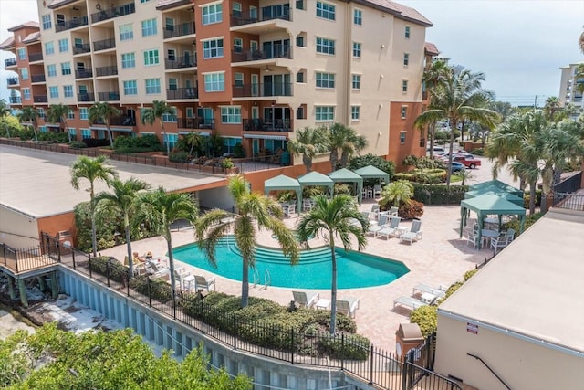 view of swimming pool featuring a patio area and a gazebo