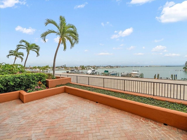 view of patio / terrace with a water view