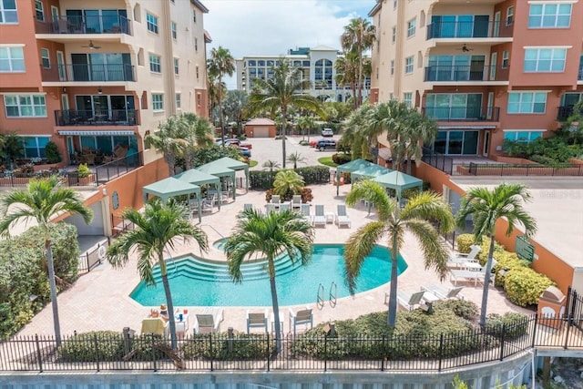 view of swimming pool featuring a patio area