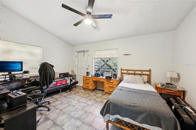 bedroom with vaulted ceiling and ceiling fan