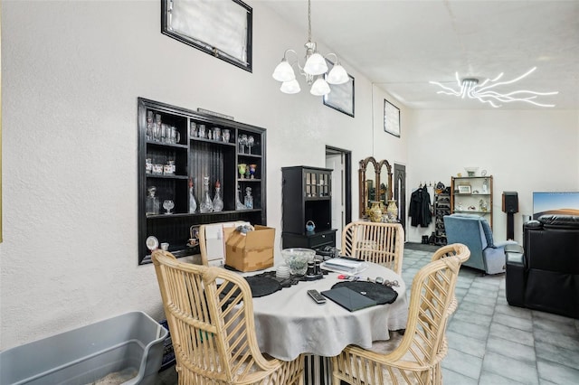 dining space with a chandelier